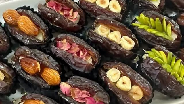 Assorted Medjoul dates filled with almonds, rose petals, hazelnuts, and pistachios